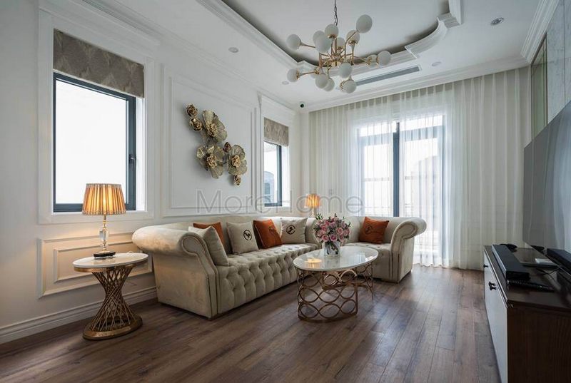 Việc thi công sofa bọc nỉ tân cổ điển trong không gian phòng khách biệt thự đẹp là một công trình đẹp.